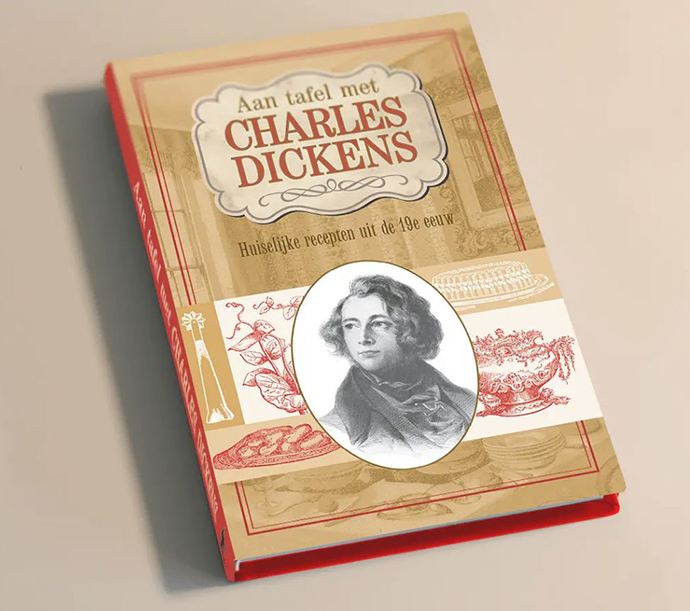 kookboek aan tafel met charles dickens